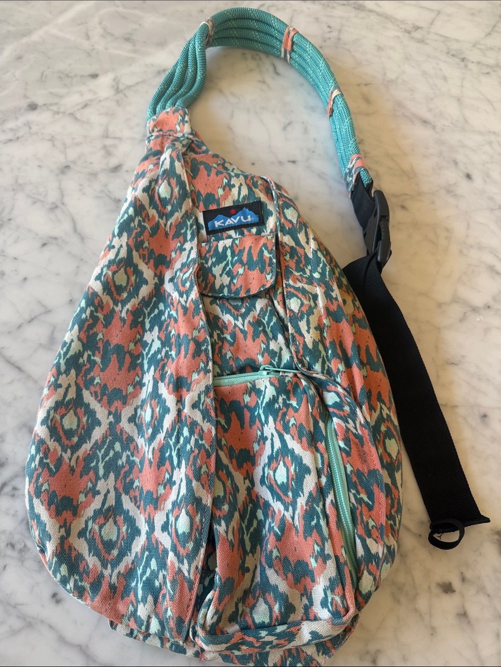 Kavu rope canvas crossbody sling bag in beach paint.